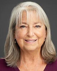 Gordon-2026 Headshot of a smiling woman with shoulder-length gray hair.